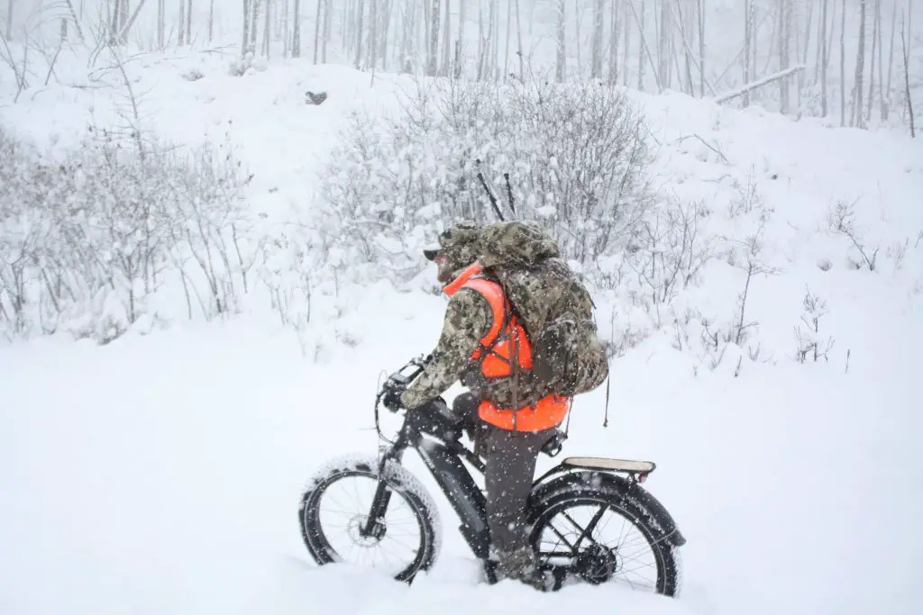 A fat bike riding through snow