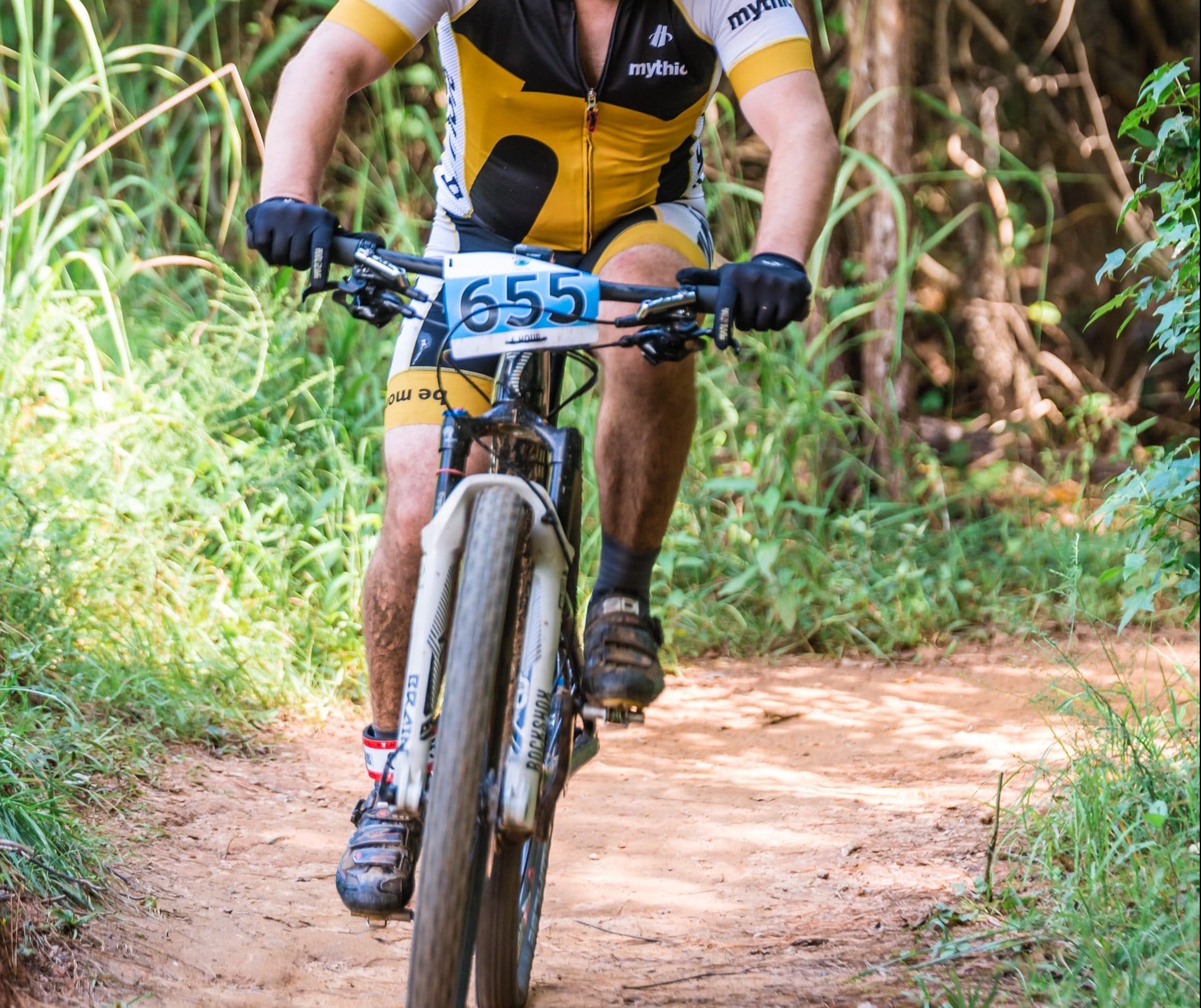 An XC rider in a Cross Country Marathon (XCM) race