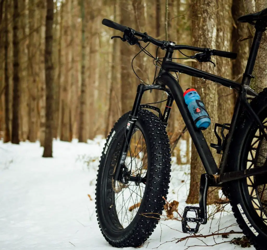 a fat bike sitting on the snow