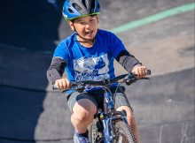kid riding a bike