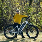 Woman wearing cycling glasses while on a fat bike