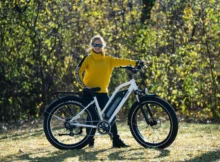 Woman wearing cycling glasses while on a fat bike